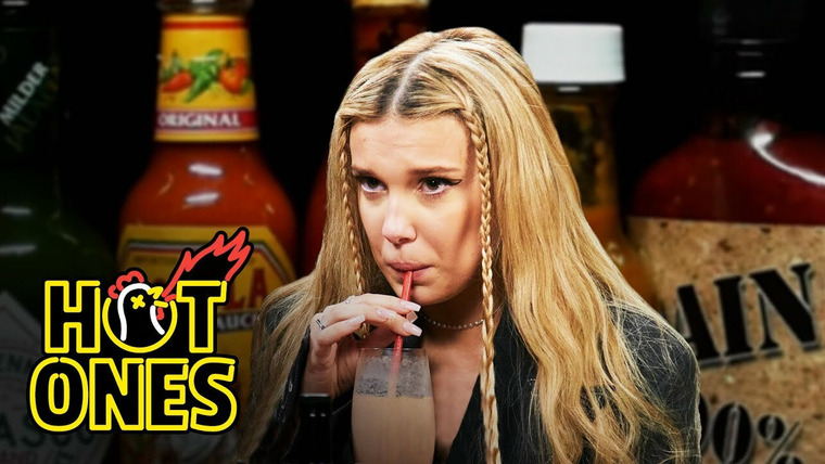 Hot Ones — s18e02 — Millie Bobby Brown Needs a Milkshake While Eating Spicy Wings