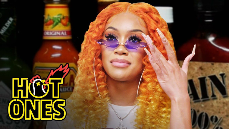 Hot Ones — s13e06 — Saweetie Almost Tap Tap Taps Out While Eating Spicy Wings