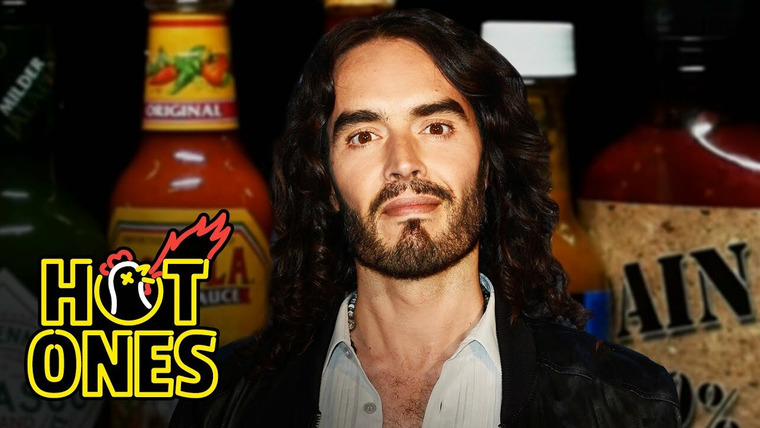 Hot Ones — s14e11 — Russell Brand Serenades Superfan Brett Baker While Eating Spicy Wings