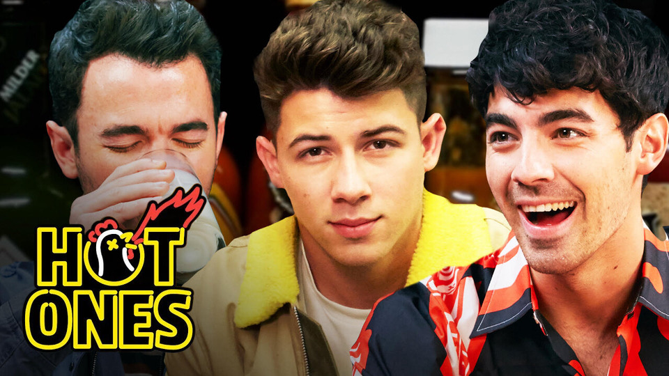 s09e01 — The Jonas Brothers Burn Up While Eating Spicy Wings