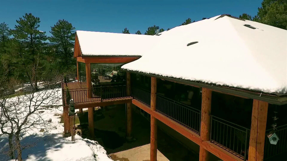 s02e12 — A Log Cabin Lookout with a Wrap-Around Porch