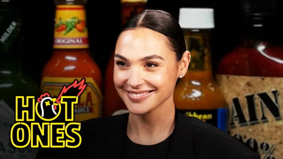 s21e12 — Gal Gadot Does a Spit Take While Eating Spicy Wings