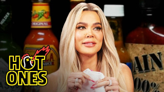 s18e05 — Khloé Kardashian Holds Back Tears While Eating Spicy Wings
