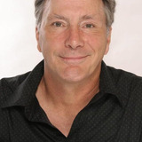 Gene Larche — Grim-Faced Con