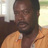 Don Powell — Professor Kamau