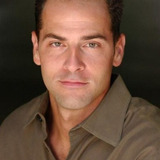 Mike Sode — Airport College Student (uncredited)