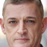 David G. Robinson — Police Sergeant White (uncredited)