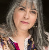 Norma Alvarez — Javier's Wife