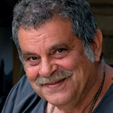 Κώστας Γουζέλης — Mini Market Owner
