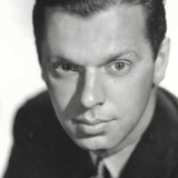 Archie Twitchell — Salesman at Men's Shop (uncredited)