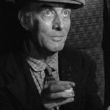 Eustace Wyatt — Budge (uncredited)