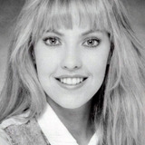 Maureen Flaherty — Game Show Hostess (uncredited)