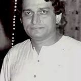 Shafi Inamdar — Amit's foster father
