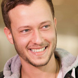 יון תומרקין — Kevin Reed