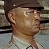 Keiichirō Katsumoto — Man at Haneda Airport (uncredited)