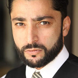 Ali Olomi — Injured Mujahadeen Soldier (uncredited)