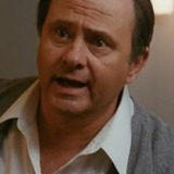 Ben Slack — Detective Sitting At Desk (uncredited)