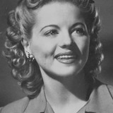 Mavis Villiers — Dependents' Hotel Reception Clerk (uncredited)