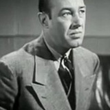 Norman Willis — Arresting Policeman (uncredited)