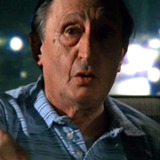 Arnaldo Caivano — Townsman at Boxing Match (uncredited)