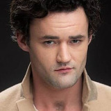 Tighe Gill — Young Trapper (uncredited)