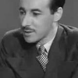 E. V. H. Emmett — Newsreel Commentator (uncredited)