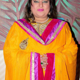 Dolly Bindra — Mrs. Panoya
