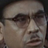 田武謙三 — Dreary Newscaster