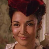 Miriam Colon — Dolores' mother