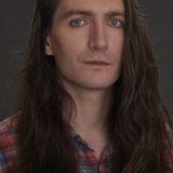Christian PK Reeve — Man On Computer