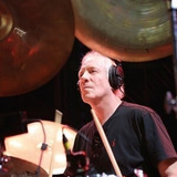 Ian Mosley — himself - Drums