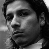 Shokat Harjo — Asal