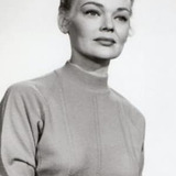 Lyn Thomas — Miss Parker (uncredited)