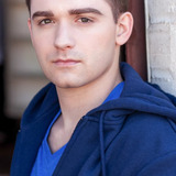 Ben Stillwell — Happy Student (uncredited)