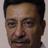 Purnendu Bhattacharya — Charu's Father