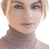 Marija Skangale — Snow Globe Dancer (uncredited)