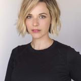 Kate Hamilton — Young Banker (uncredited)
