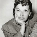 Eleanor Keaton — Swimmer (uncredited)