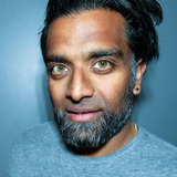Sanj Surati — Passerby (uncredited)