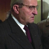 Enzo Mondino — Journalist at Press Conference (uncredited)