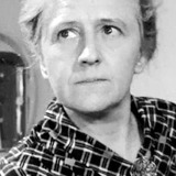 Hanny Schedin — Cleaning woman (uncredited)