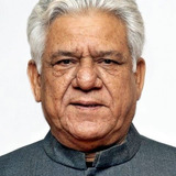 Om Puri — Raja's Father