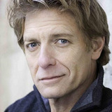 Patrick Leo Holland — CNN Newscaster (uncredited)
