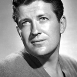 Russell Wade — Yacht Party Guest (uncredited)