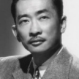 Richard Loo — Shanghai Airport Official (uncredited)