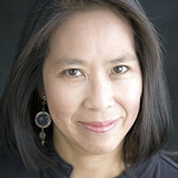 Judy Wong — Le Duc's wife (uncredited)