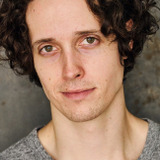 Isiah Adams — Young Stock Broker (uncredited)