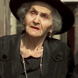 Regina Elena Bisio — Old Woman in the Tavern (uncredited)