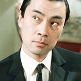 Burt Kwouk — Uncle Taï