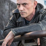 Gabriele Guerra — Escort Agent (uncredited)